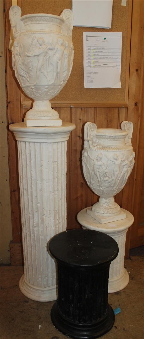 White painted pillar, with 2 vases and 2 smaller pillars